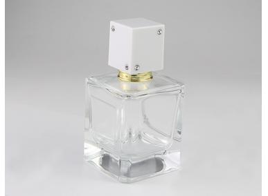 botella de perfume de cubo
