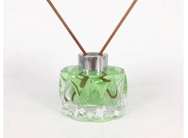 botella de vidrio difusor verde