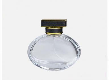 frasco de perfume personalizado con tapa dorada